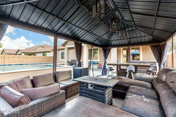 a outdoor living space with furniture