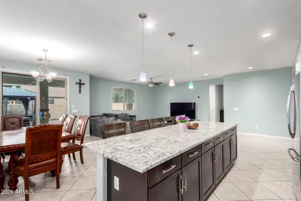 a kitchen island kitchen island a table and chairs