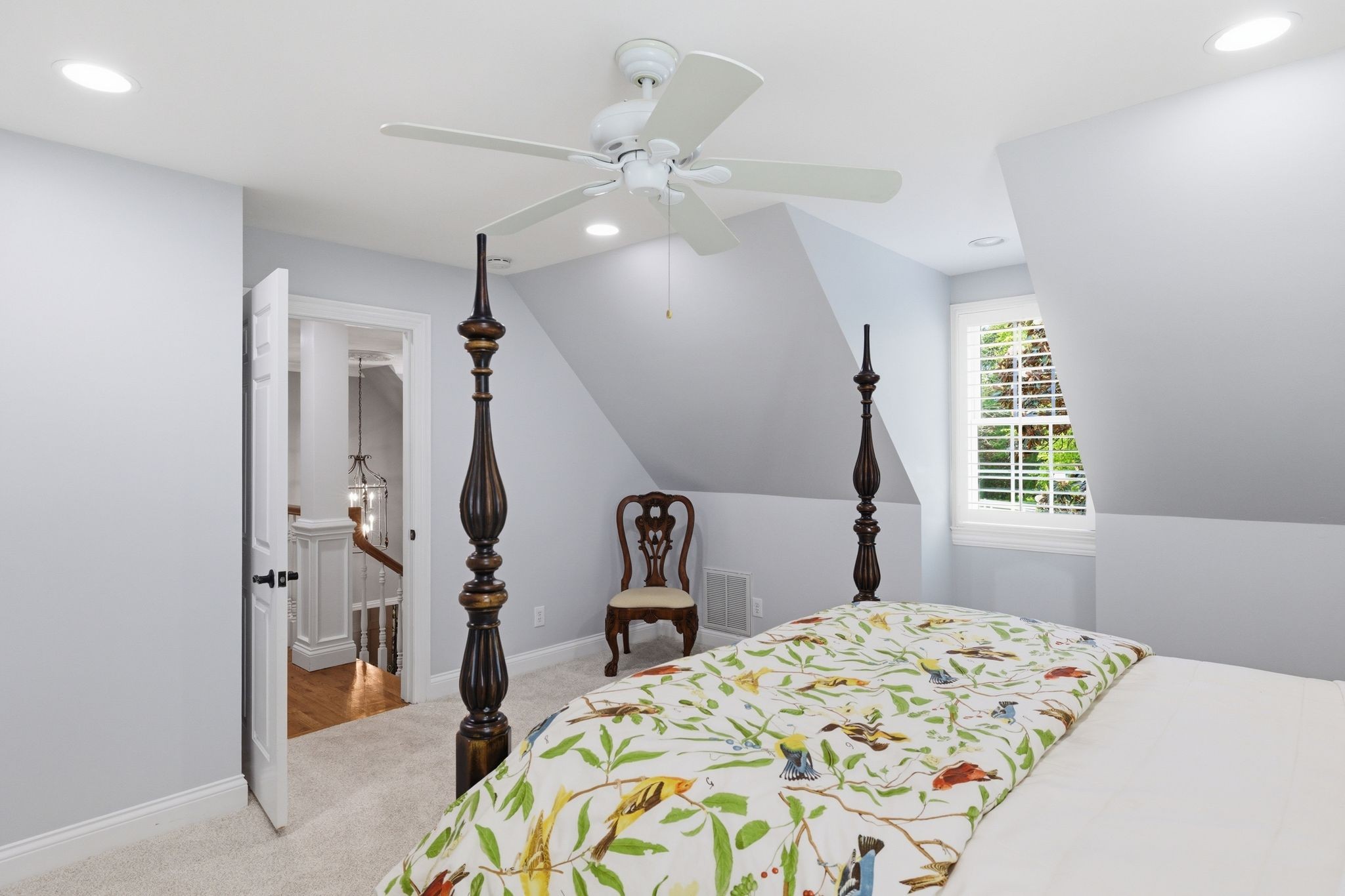 3016 Duplex Road Spring Hill, TN 37174 - Photo 31 of 61 a bedroom with a bed and a chandelier