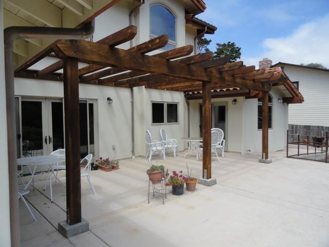 3165 Bird Rock Road Pebble Beach, CA 93953 - Photo 17 of 18 a view of a porch with seating space
