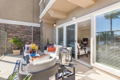 a building outdoor space with patio furniture