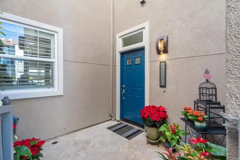 a flower room with wooden floor and a window