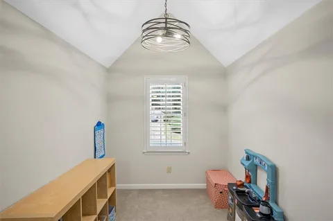 a view of livingroom with furniture and windows