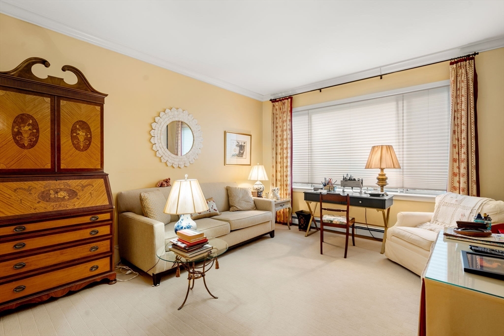 228 Allandale Road, Unit 1A Boston, MA 02467 - Photo 15 of 17 a living room with furniture and a window
