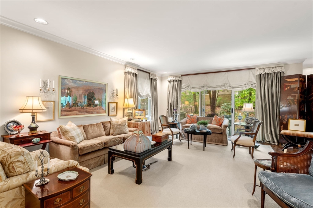 228 Allandale Road, Unit 1A Boston, MA 02467 - Photo 4 of 17 a living room with furniture and a large window