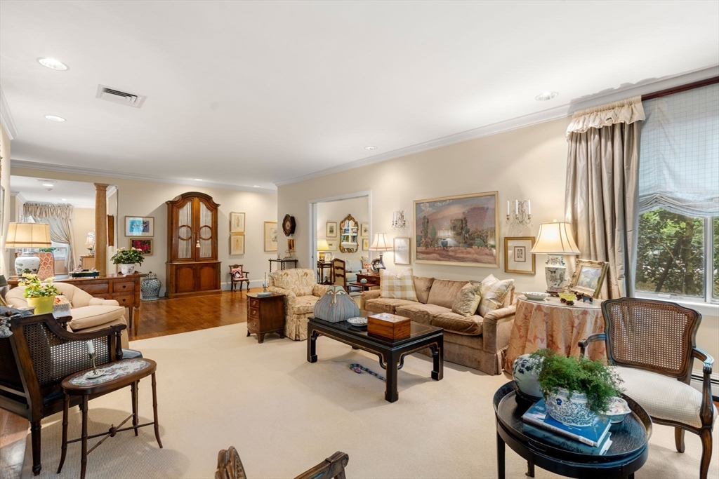 228 Allandale Road, Unit 1A Boston, MA 02467 - Photo 5 of 17 a living room with furniture and a large window