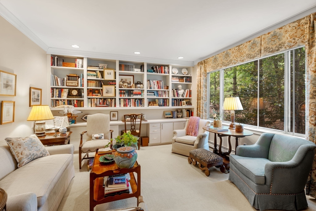 228 Allandale Road, Unit 1A Boston, MA 02467 - Photo 9 of 17 a living room with furniture and a large window