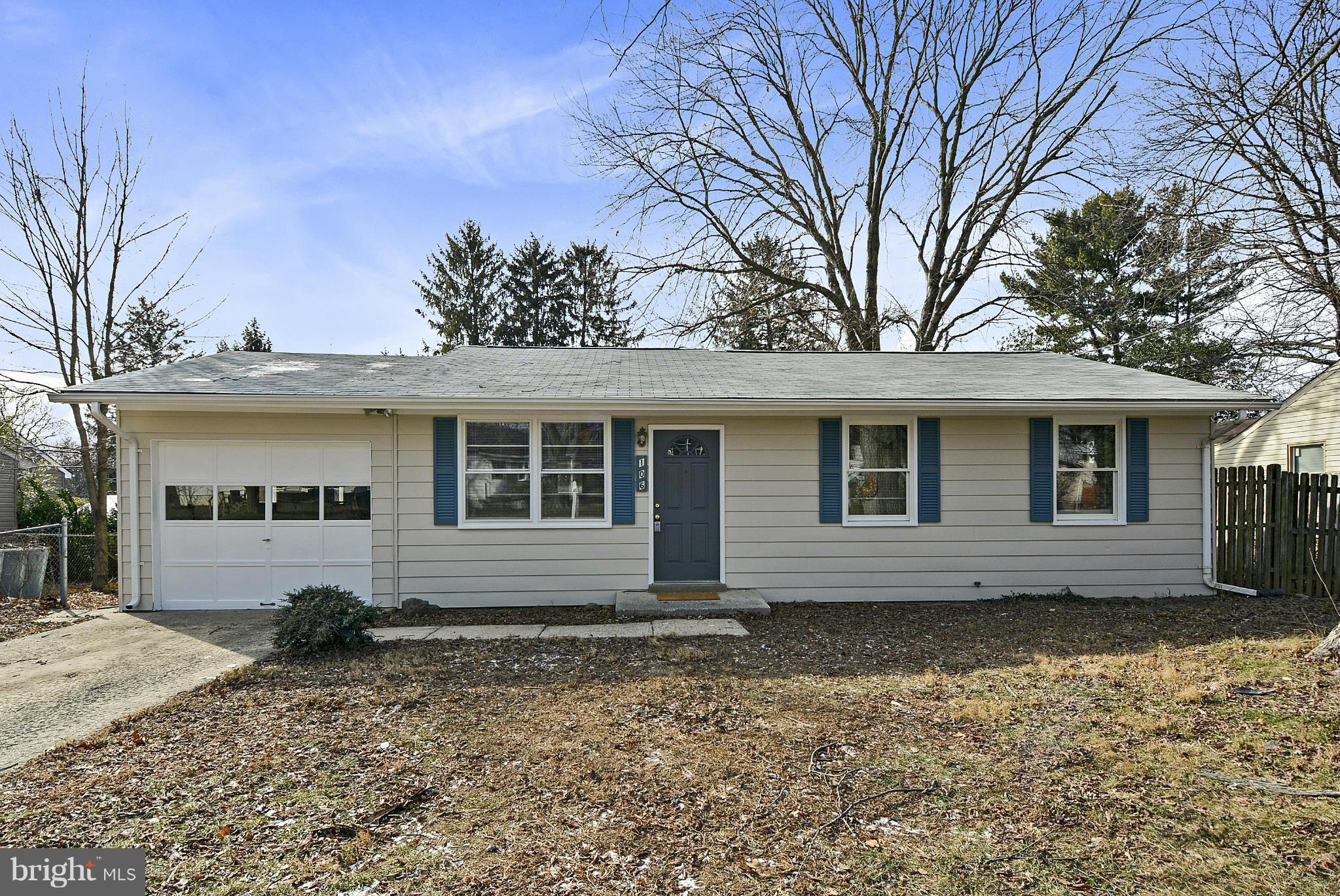 106 Harmony Hall Road Gaithersburg, MD 20877 - Photo 1 of 30 a front view of a house with garden
