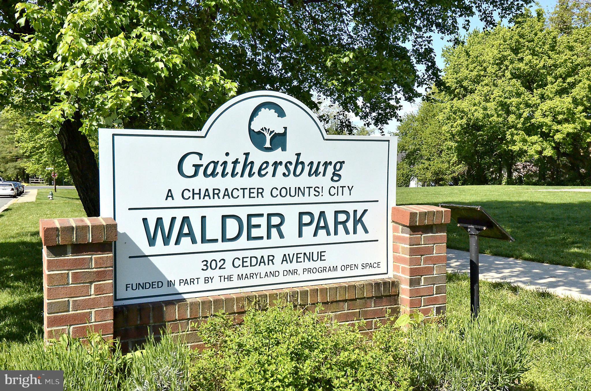 106 Harmony Hall Road Gaithersburg, MD 20877 - Photo 25 of 30 a sign on the side of a building