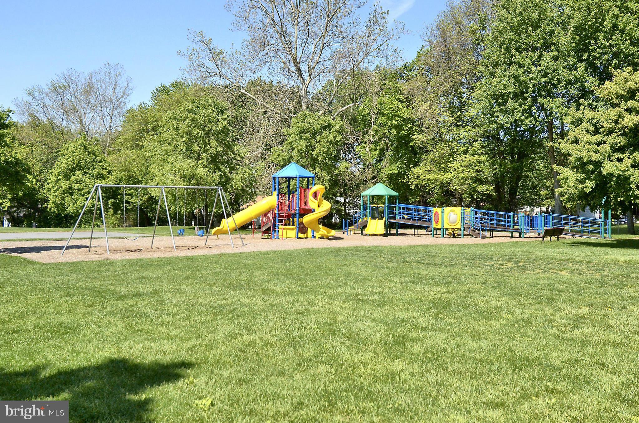 106 Harmony Hall Road Gaithersburg, MD 20877 - Photo 26 of 30 a view of a park with swings and slides