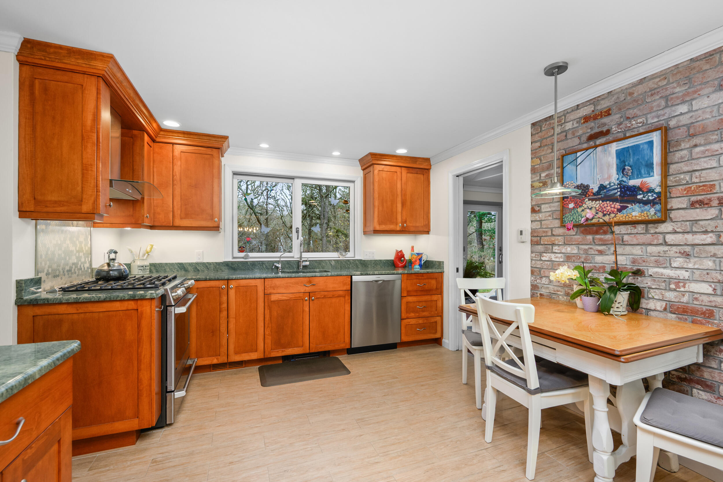 28 Lakeview Avenue Chatham, MA 02633 - Photo 13 of 63 a kitchen with granite countertop a sink cabinets and appliances