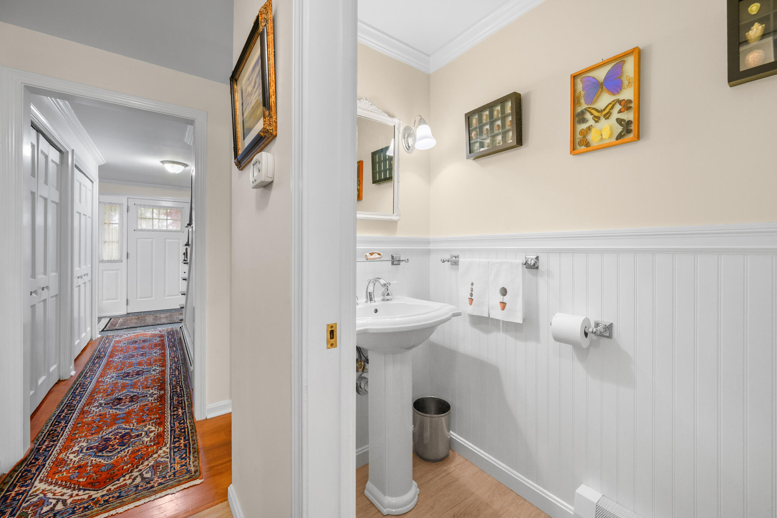 28 Lakeview Avenue Chatham, MA 02633 - Photo 20 of 63 a bathroom with a sink and mirror with toilet