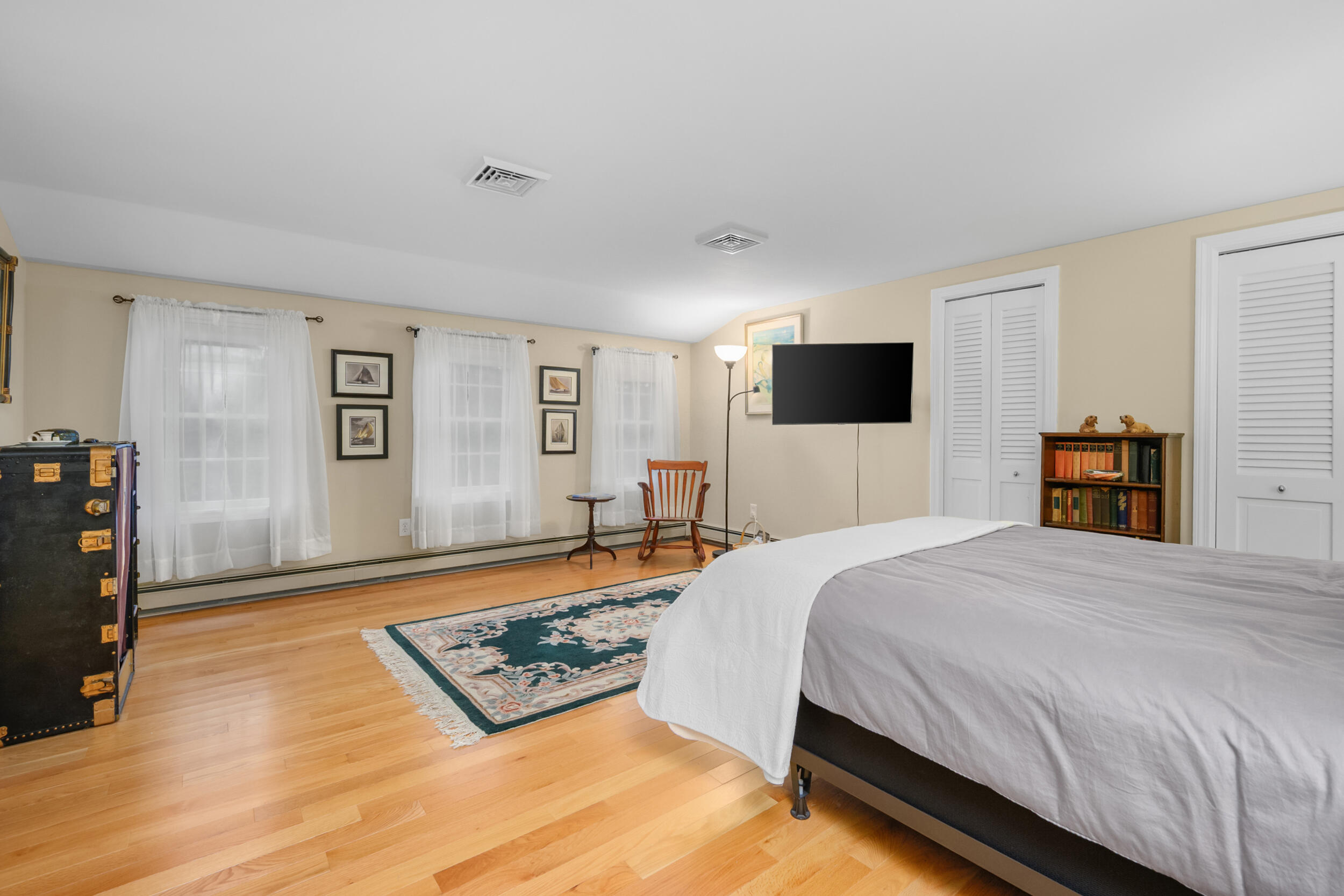 28 Lakeview Avenue Chatham, MA 02633 - Photo 28 of 63 a bedroom with a bed and a television