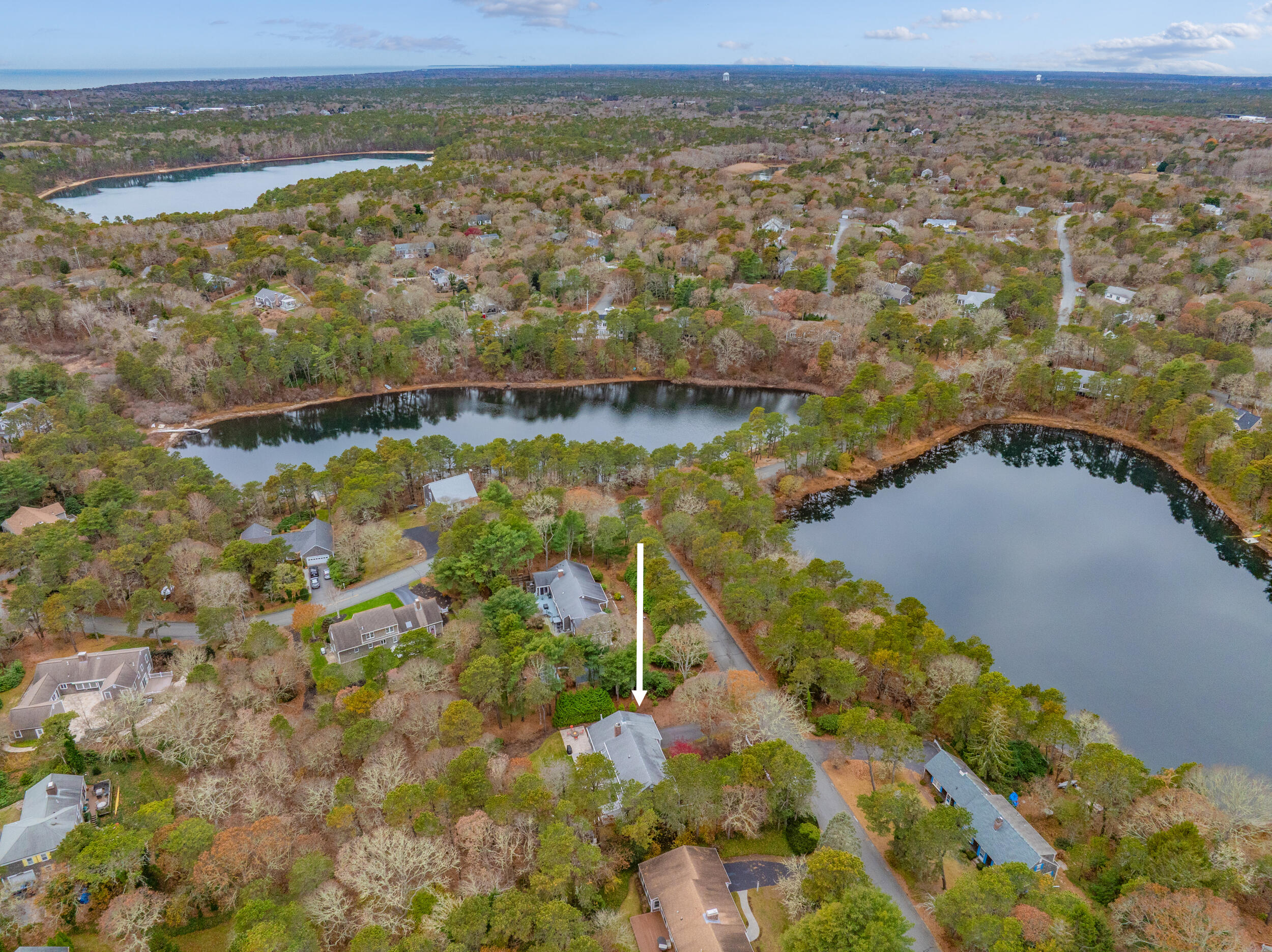 28 Lakeview Avenue Chatham, MA 02633 - Photo 52 of 63 an aerial view of a houses with a lake view