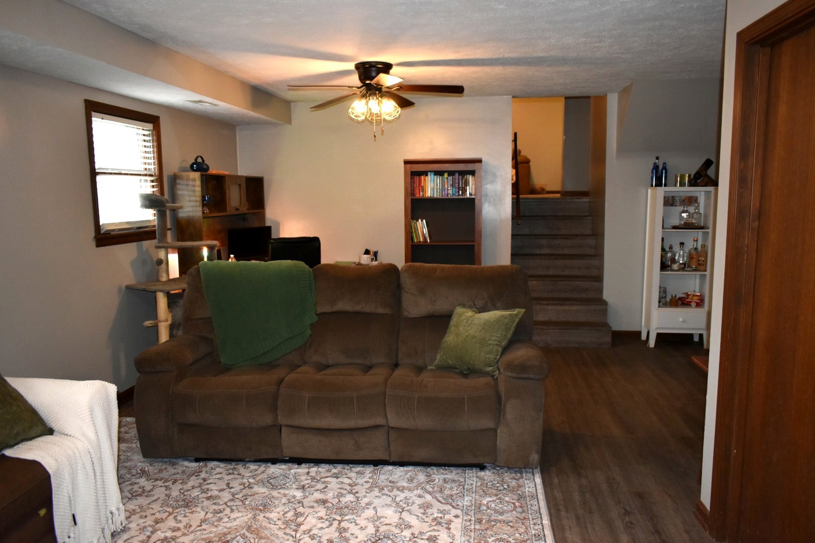 35 West 5th Street El Paso, IL 61738 - Photo 13 of 29 a living room with furniture and a wooden floor