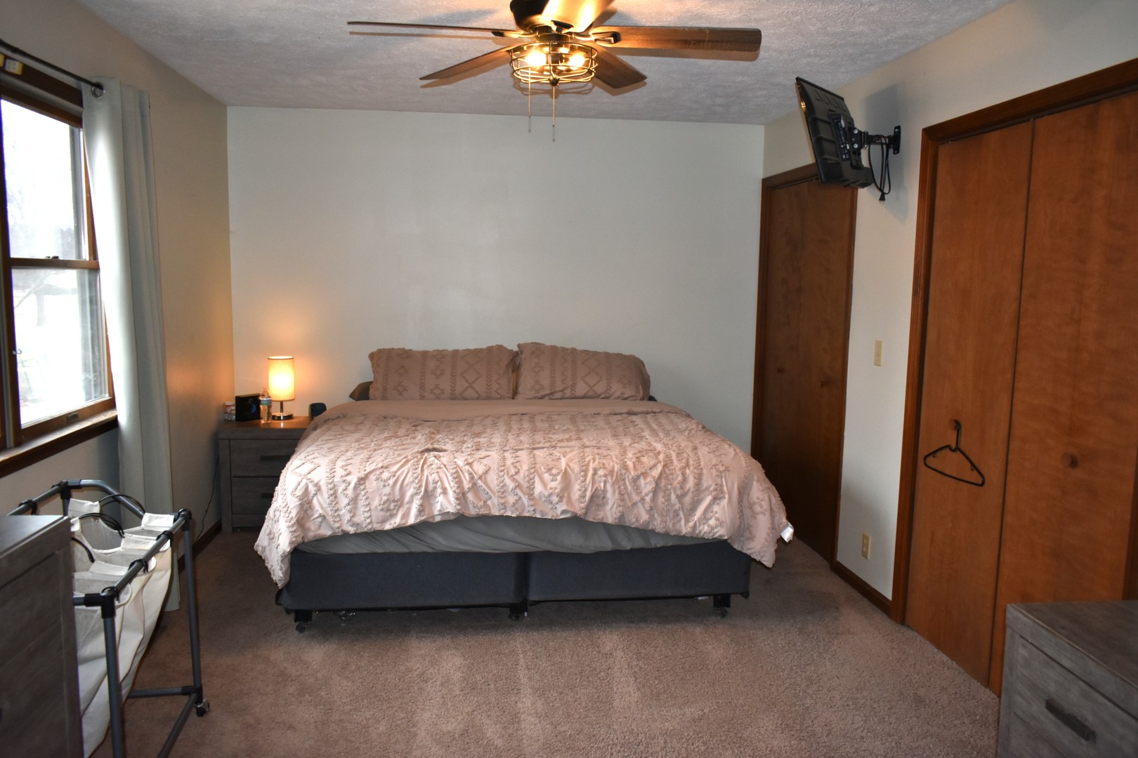 35 West 5th Street El Paso, IL 61738 - Photo 18 of 29 a bedroom with a bed dresser and a window