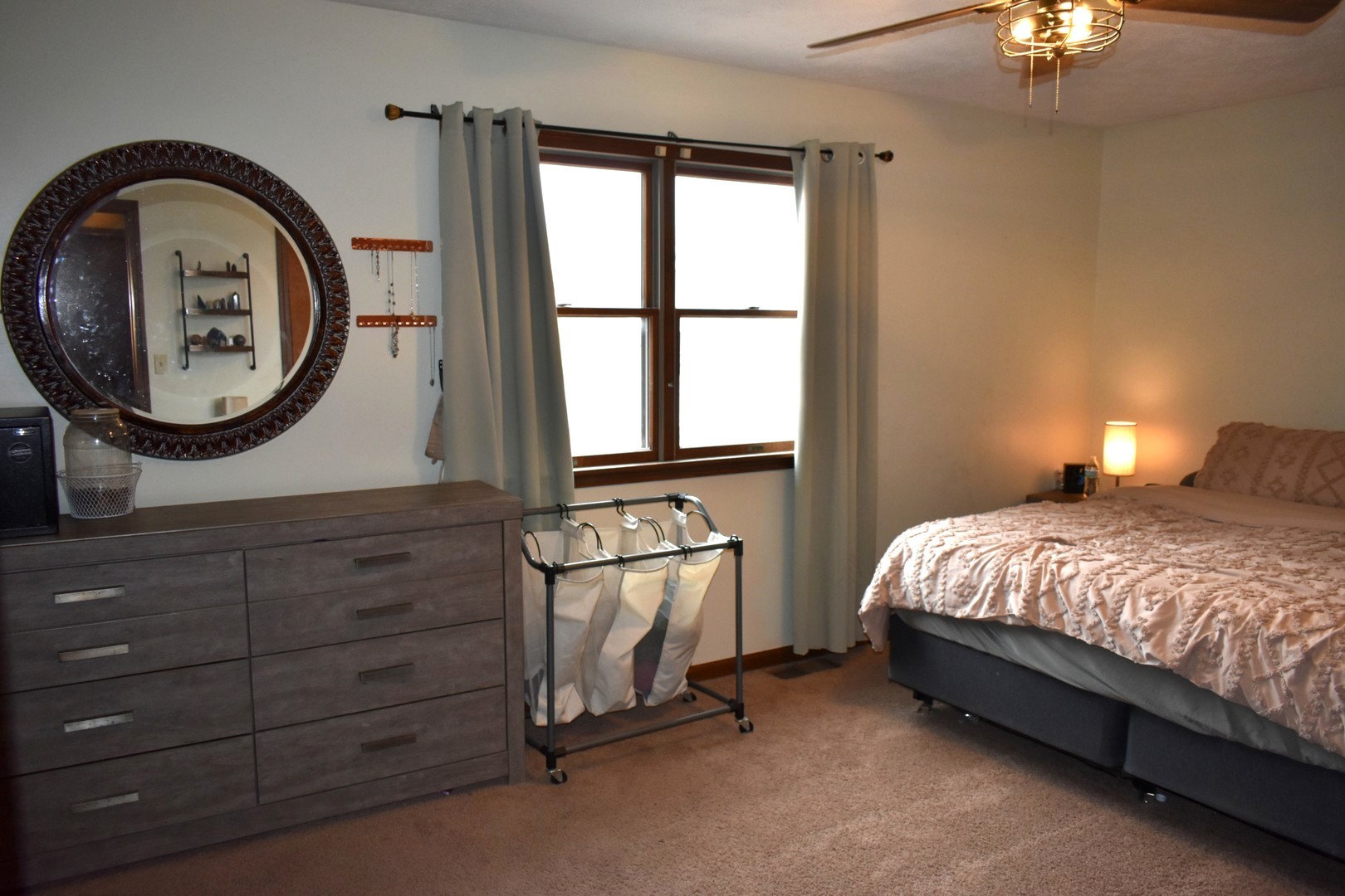 35 West 5th Street El Paso, IL 61738 - Photo 21 of 29 a spacious bedroom with a bed and a dresser