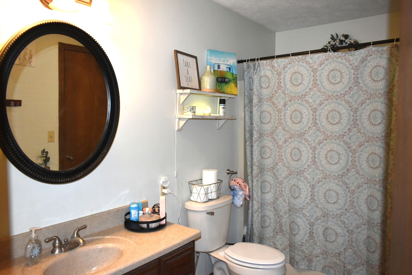 35 West 5th Street El Paso, IL 61738 - Photo 22 of 29 a bathroom with a sink and a mirror