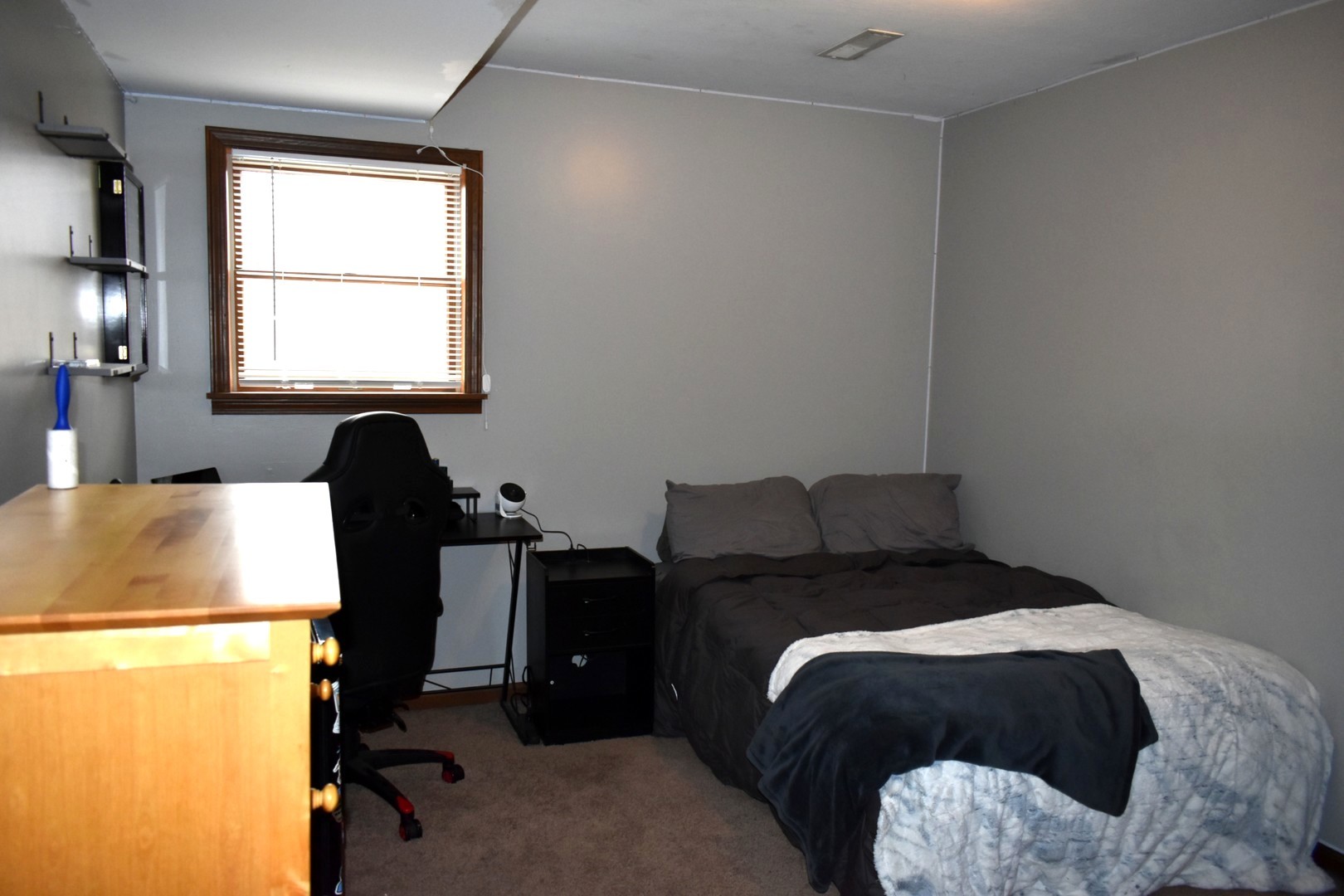 35 West 5th Street El Paso, IL 61738 - Photo 27 of 29 a bedroom with a bed and a window