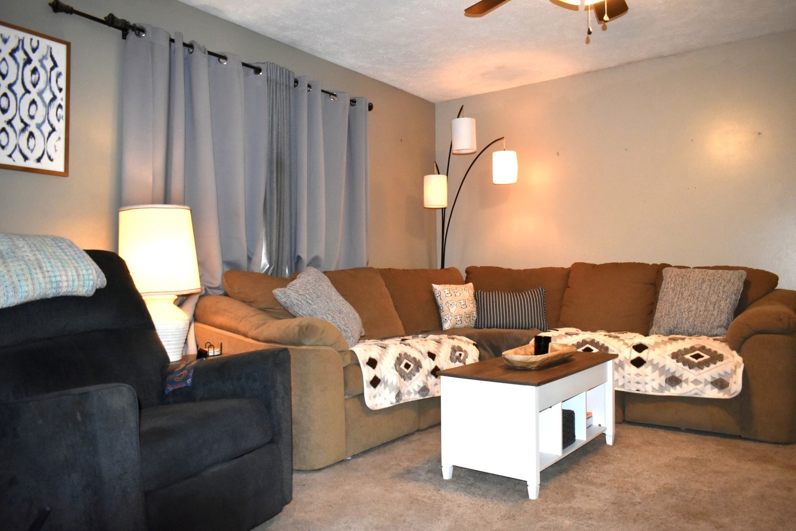 35 West 5th Street El Paso, IL 61738 - Photo 4 of 29 a living room with a couch and a window