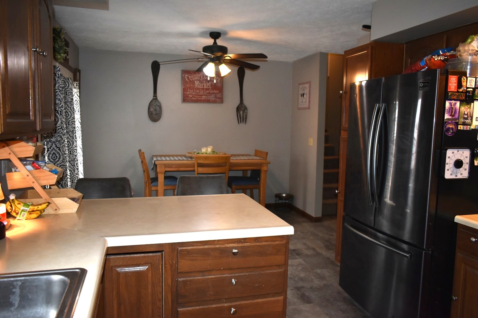 35 West 5th Street El Paso, IL 61738 - Photo 9 of 29 a kitchen with a refrigerator and a sink