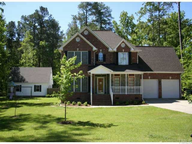 99 Skinner Road Four Oaks, NC 27524 - Photo 1 of 10 Beautiful custom built home w/ stone and brick front!! Exterior Front