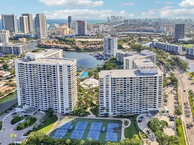 a view of a city with tall buildings