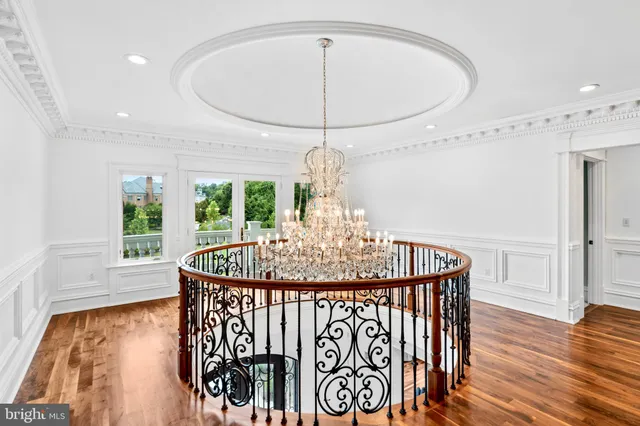 a bed sitting in a room next to a window