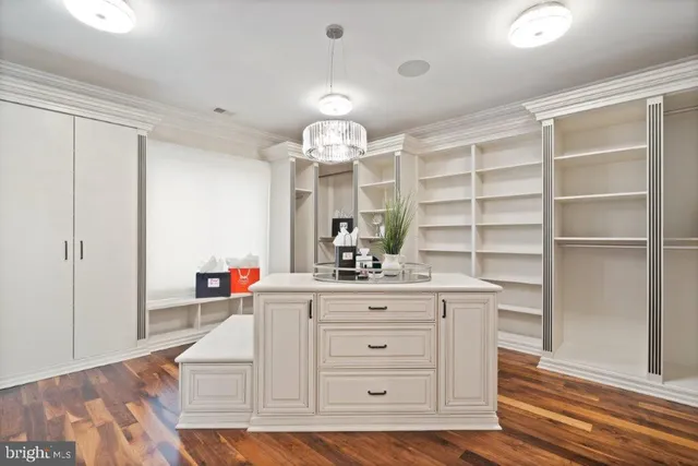 a spacious bathroom with a double vanity sink and a mirror