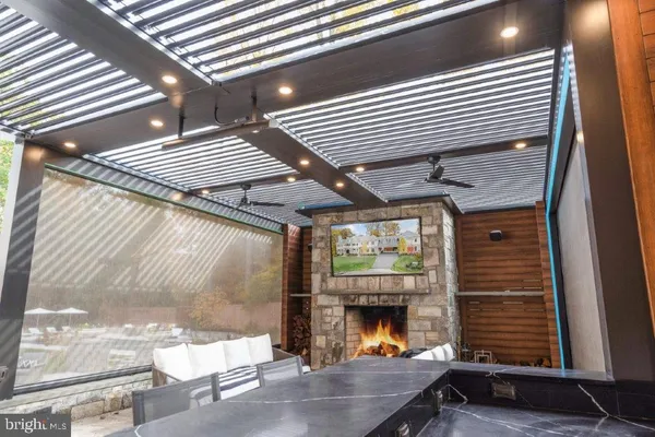 a view of a patio with a table and chairs