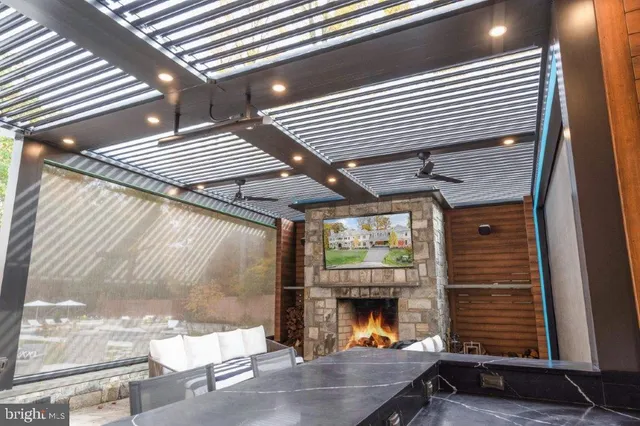 a view of a patio with a table and chairs