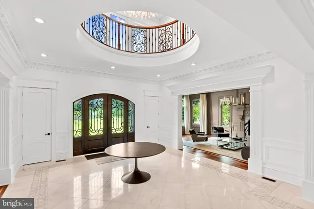 a view of a livingroom with furniture window and wooden floor