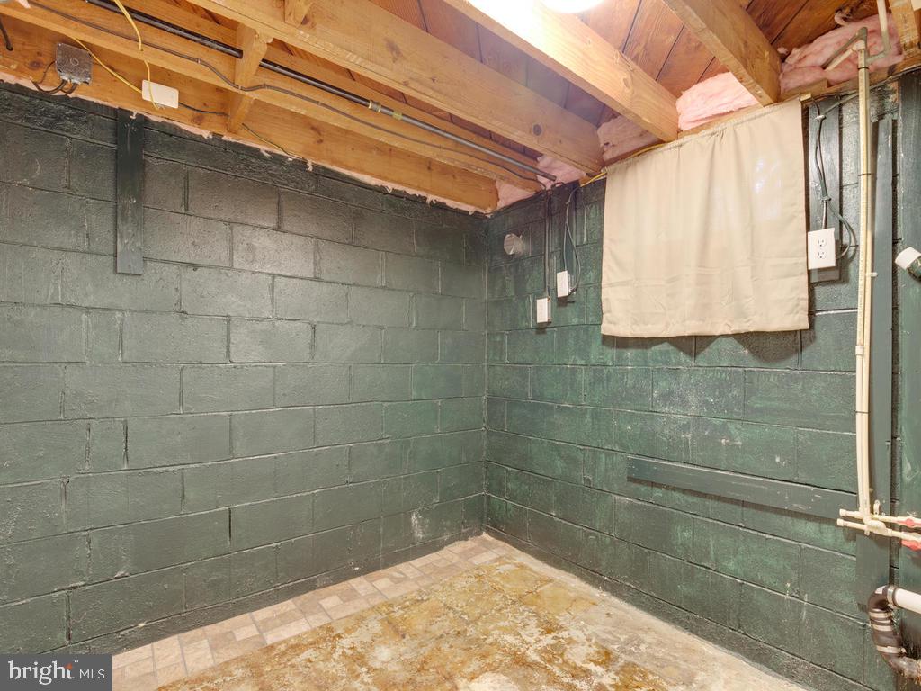 313 Charles Road Linthicum, MD 21090 - Photo 19 of 35 space behind built-in cabinetry-room for a bath