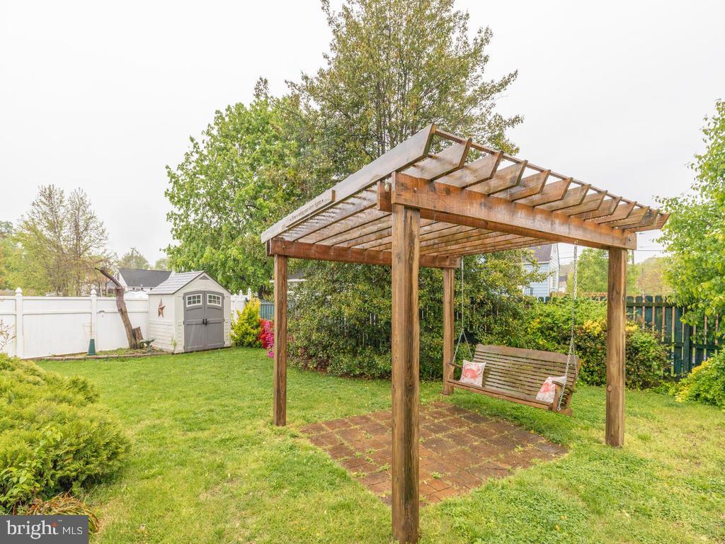 313 Charles Road Linthicum, MD 21090 - Photo 31 of 35 Pergola and swing convey.