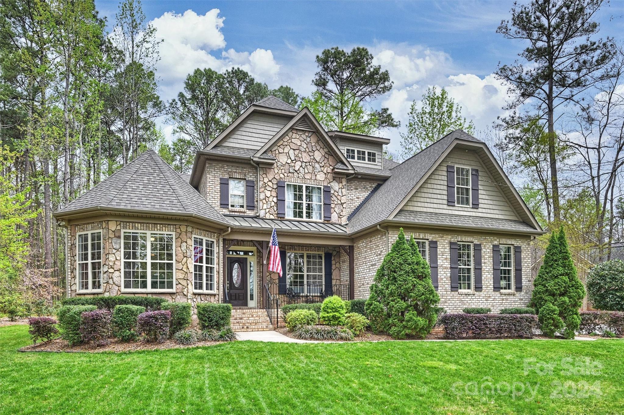 7019 Montgomery Road Lake Wylie, SC 29710 - Photo 1 of 48 front view of a house with a yard