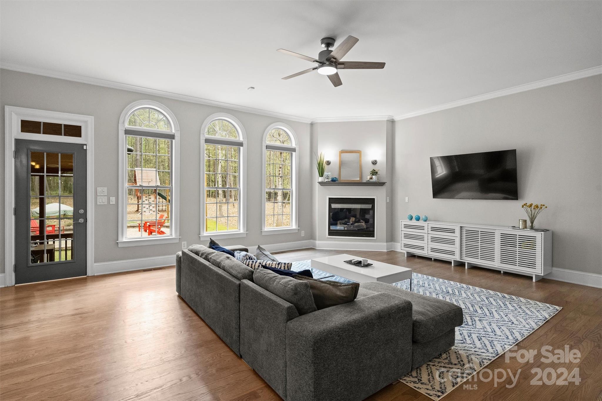 7019 Montgomery Road Lake Wylie, SC 29710 - Photo 15 of 48 a living room with furniture windows and a flat screen tv