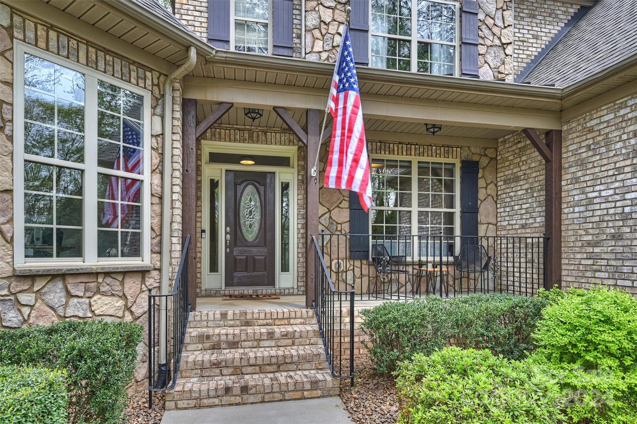 7019 Montgomery Road Lake Wylie, SC 29710 - Photo 2 of 48 a front view of a house with a large window
