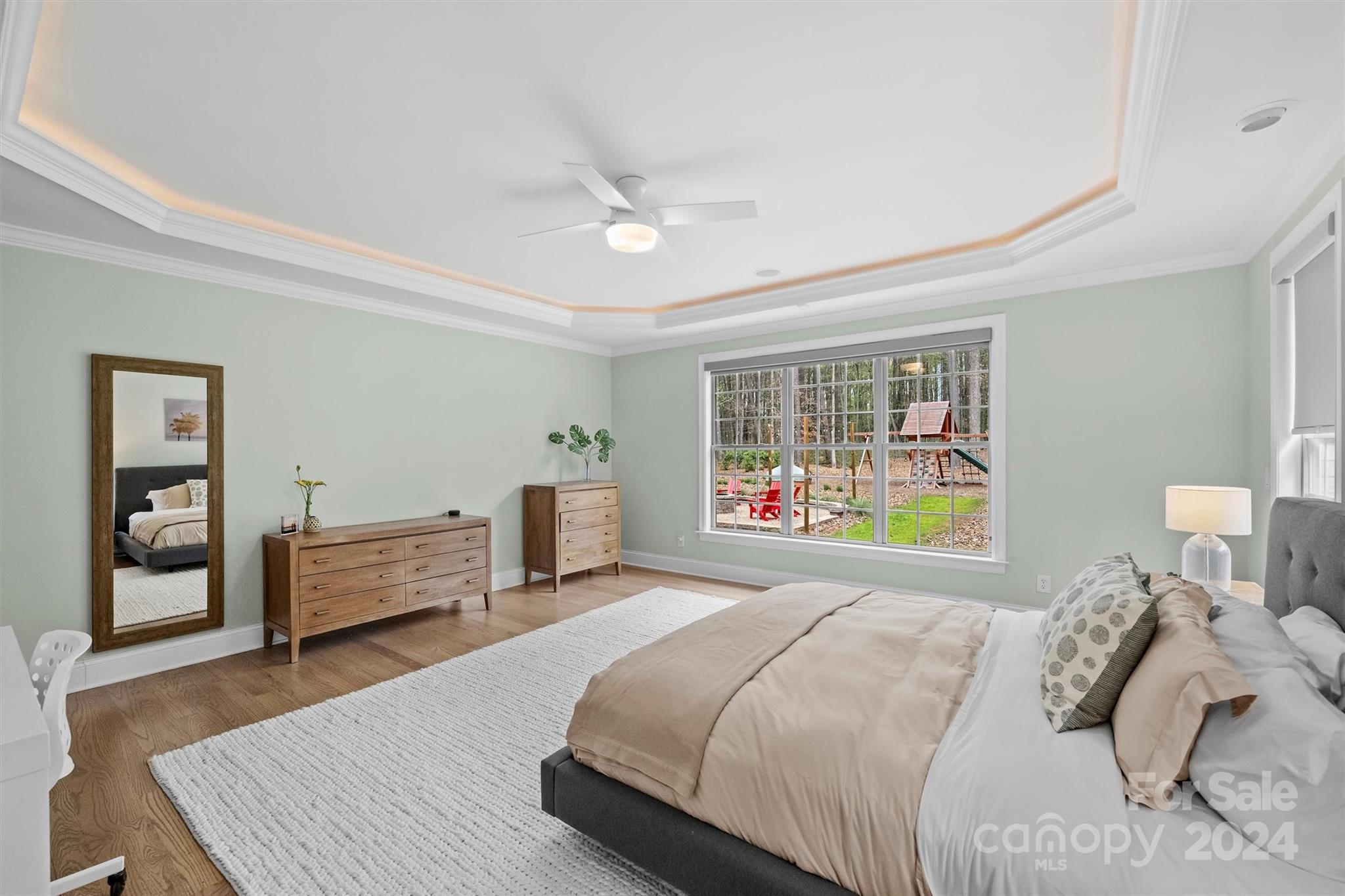 7019 Montgomery Road Lake Wylie, SC 29710 - Photo 21 of 48 a bedroom with a large bed and a window