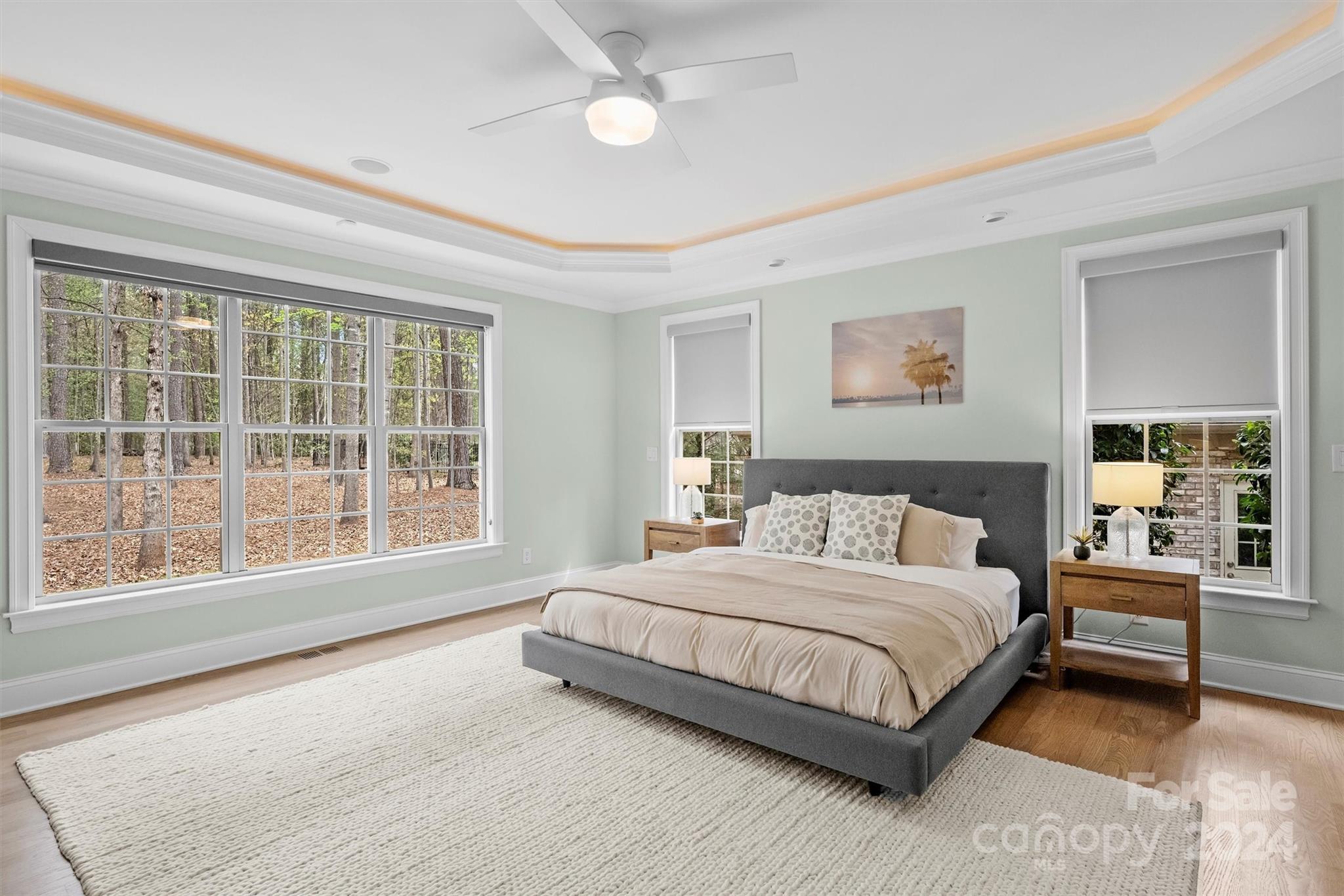 7019 Montgomery Road Lake Wylie, SC 29710 - Photo 22 of 48 a bedroom with a large bed and a large window