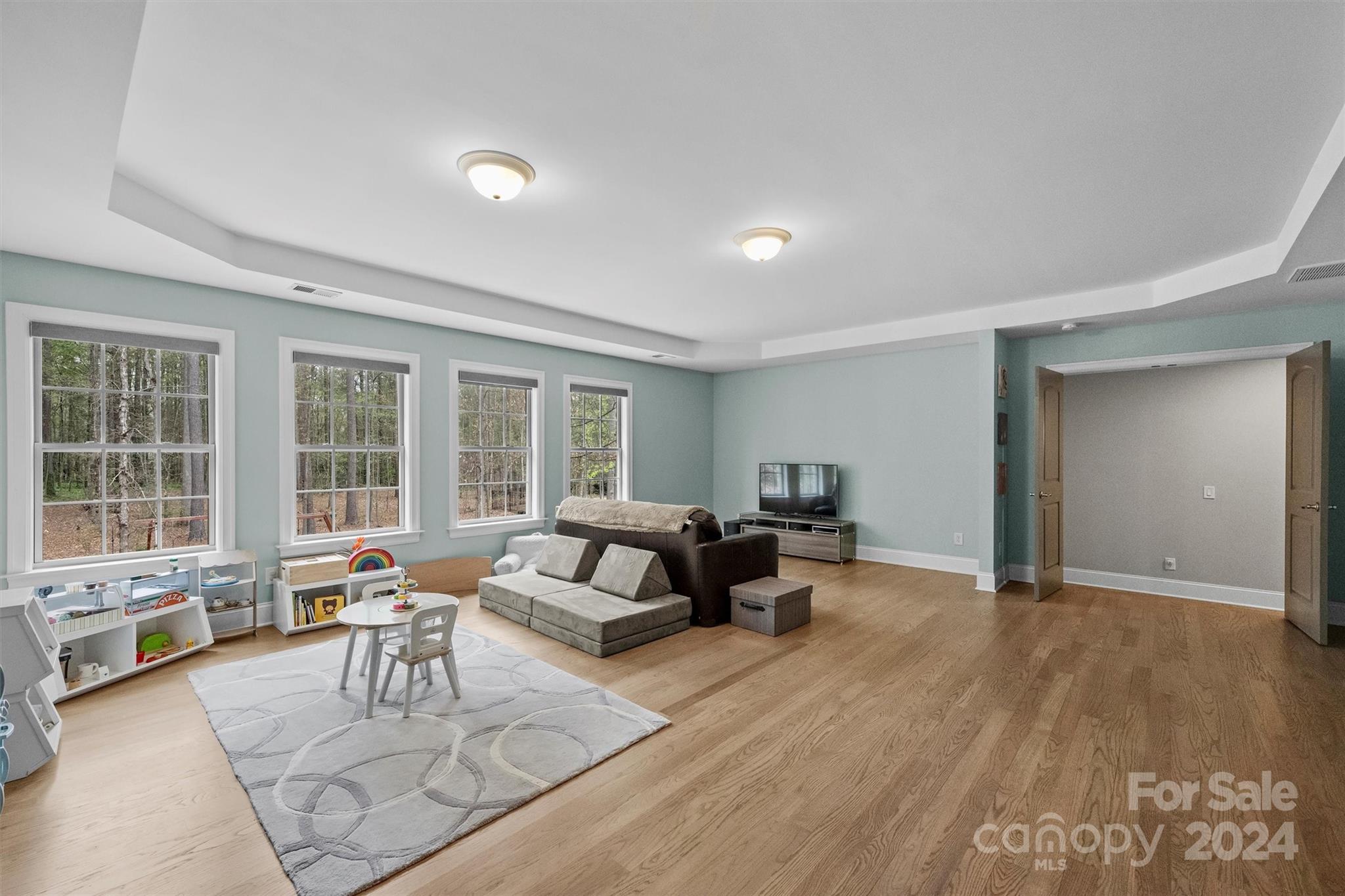 7019 Montgomery Road Lake Wylie, SC 29710 - Photo 28 of 48 a living room with furniture and a large window