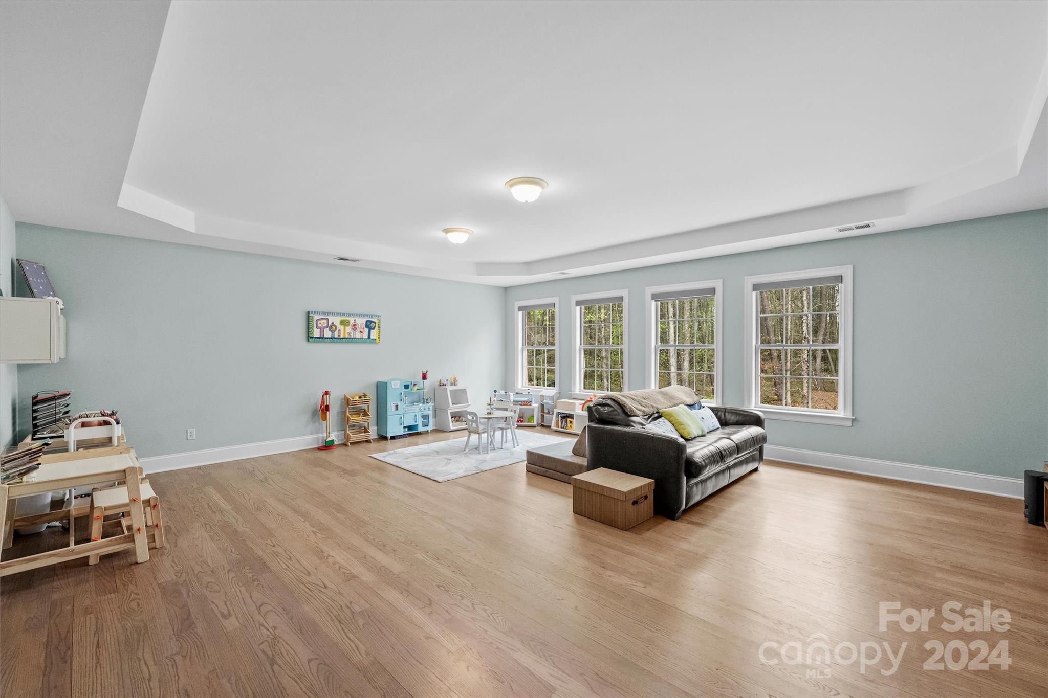 7019 Montgomery Road Lake Wylie, SC 29710 - Photo 30 of 48 a living room with furniture and a large window