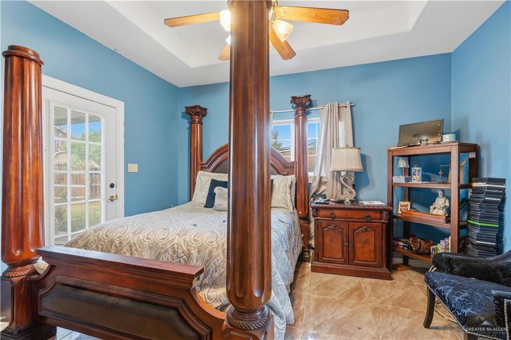 1315 Rio Comal Circle San Juan, TX 78589 - Photo 11 of 16 a bedroom with furniture and a book shelf