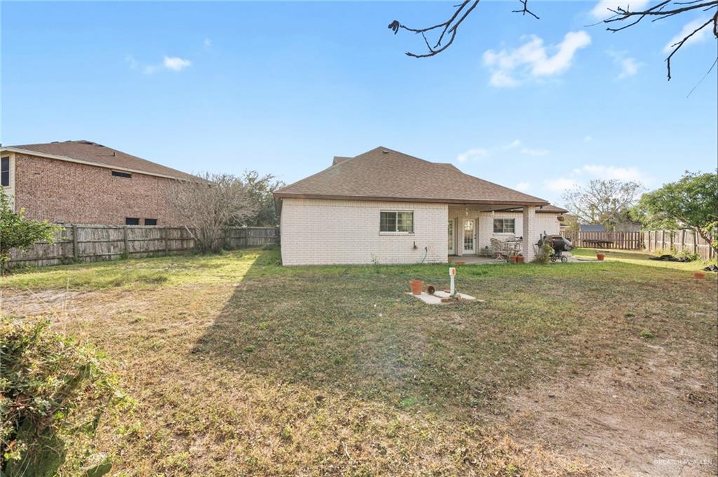 1315 Rio Comal Circle San Juan, TX 78589 - Photo 16 of 16 a house view with a garden space