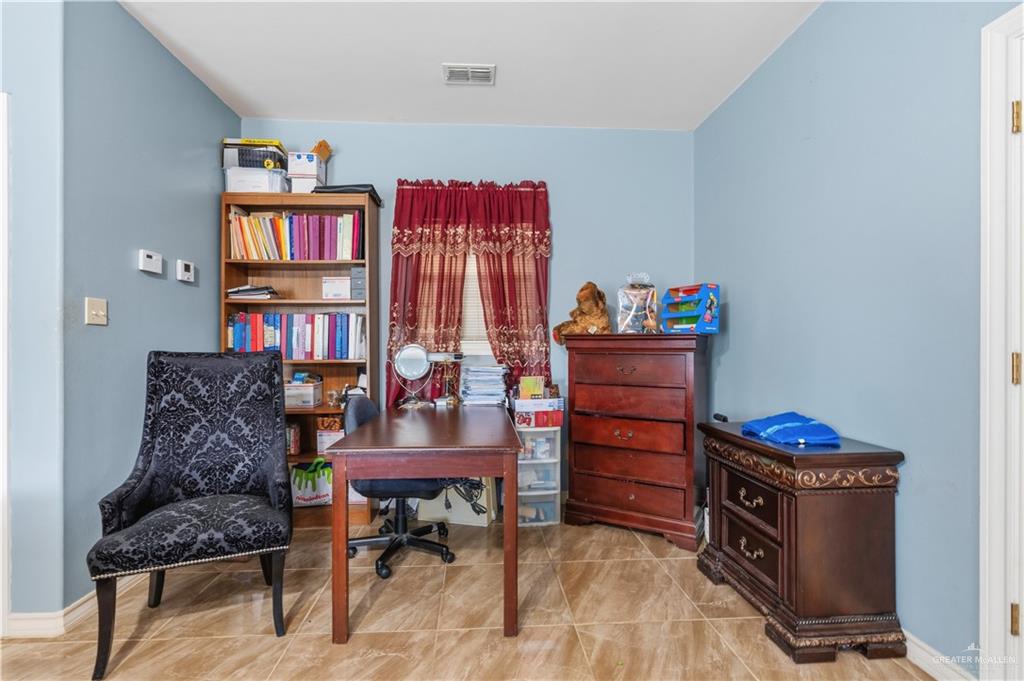 1315 Rio Comal Circle San Juan, TX 78589 - Photo 8 of 16 a workspace with furniture and window