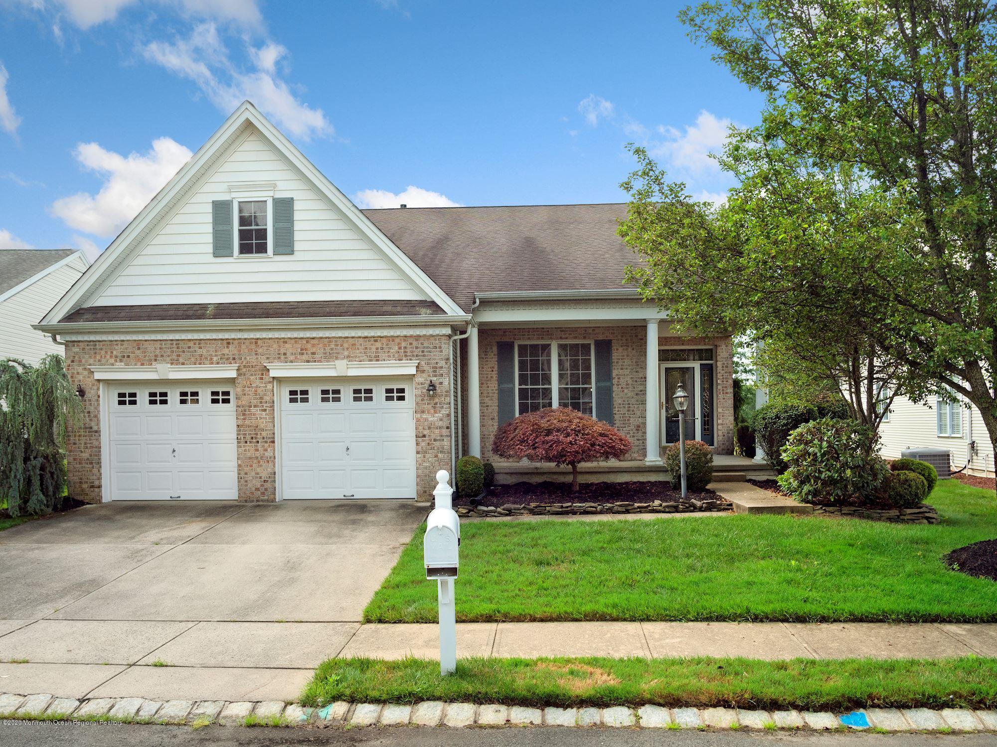 15 Winged Foot Road Jackson, NJ 08527 - Photo 1 of 34 a front view of house with yard and green space