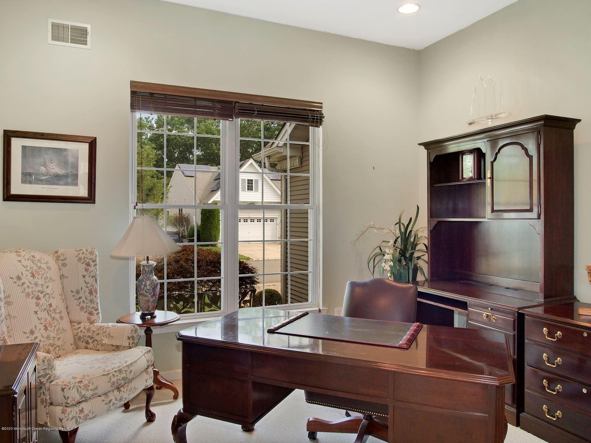15 Winged Foot Road Jackson, NJ 08527 - Photo 15 of 34 a living room with furniture and a flat screen tv