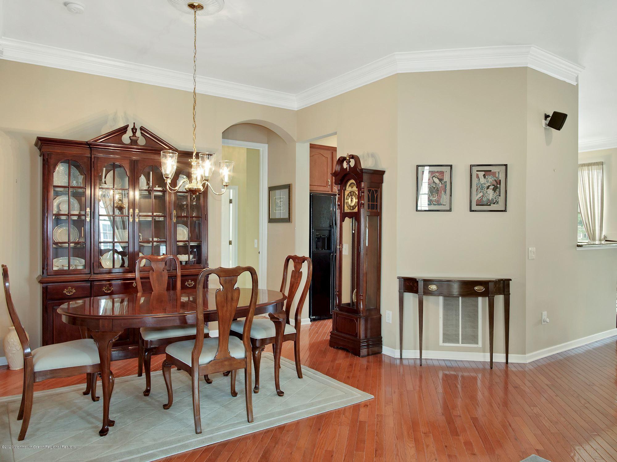 15 Winged Foot Road Jackson, NJ 08527 - Photo 16 of 34 a view of a dining room with furniture window and wooden floor