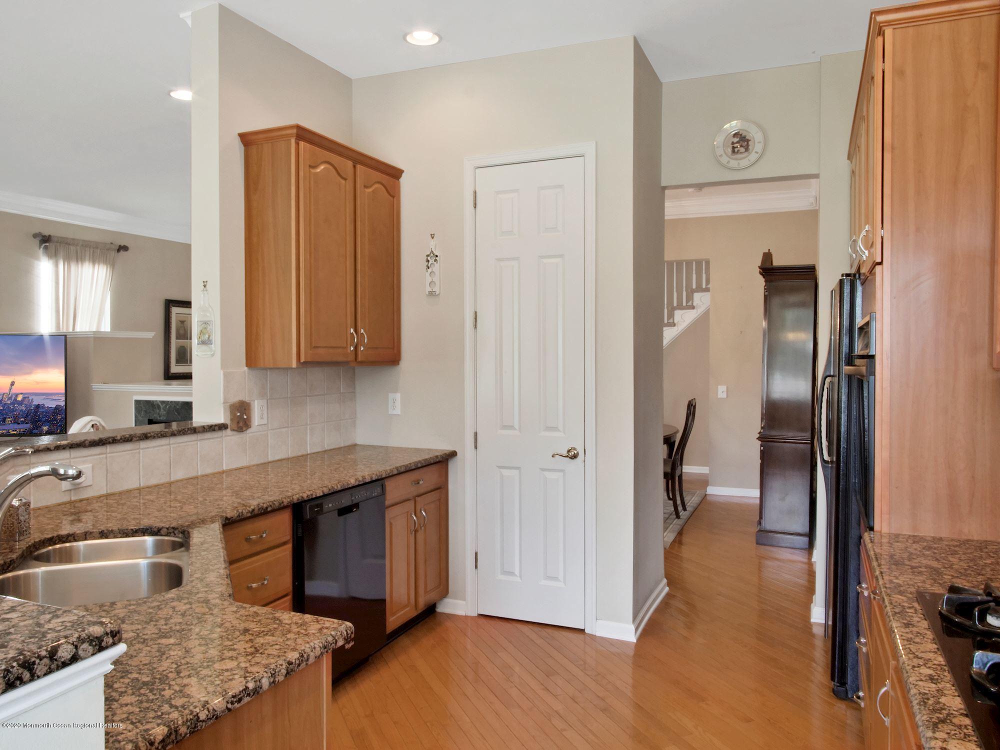 15 Winged Foot Road Jackson, NJ 08527 - Photo 21 of 34 a kitchen with stainless steel appliances granite countertop a refrigerator and a sink