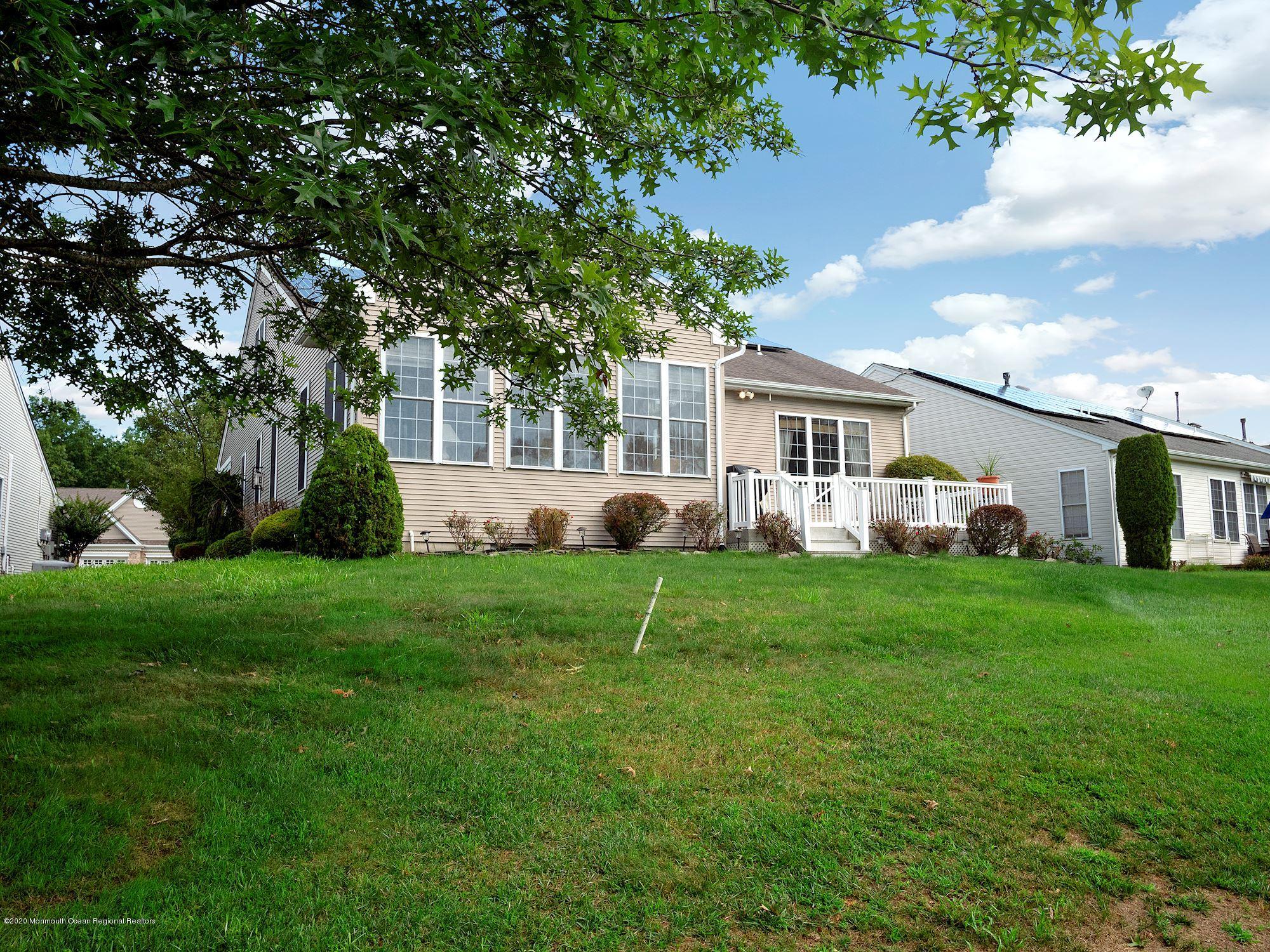 15 Winged Foot Road Jackson, NJ 08527 - Photo 33 of 34 a front view of house with yard and green space