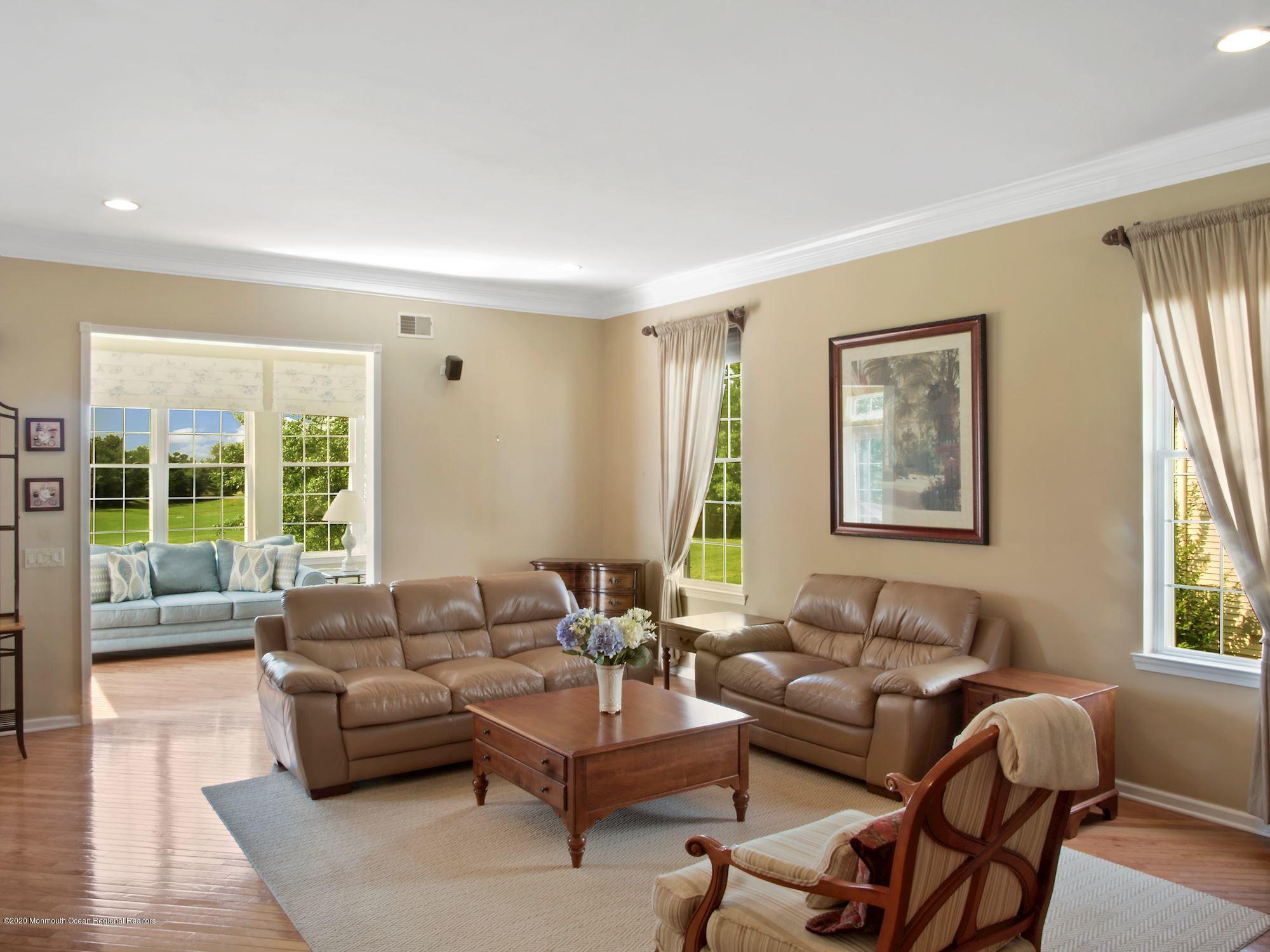15 Winged Foot Road Jackson, NJ 08527 - Photo 7 of 34 a living room with furniture and a large window